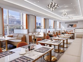 4 restaurants, breakfast, lunch, dinner served; Chinese cuisine