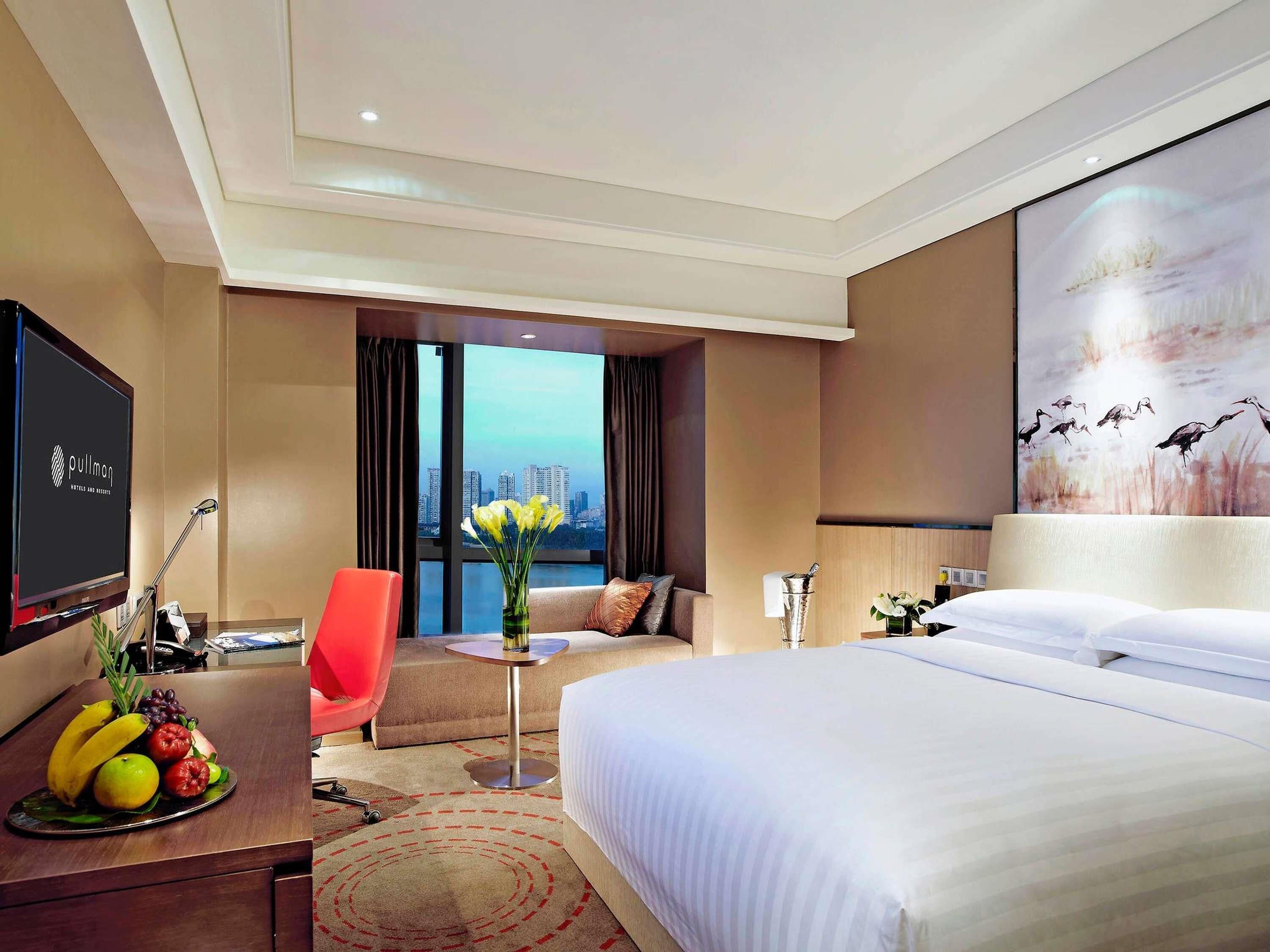 Deluxe Room, 1 King Bed, Lake View | Minibar, in-room safe, desk, laptop workspace