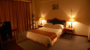 Suite | Living room | 32-inch LED TV with digital channels, TV - Mingyuan Xindu Hotel (Nanning)