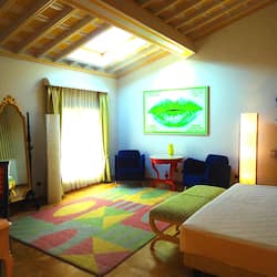 Junior Suite Premium | Area soggiorno | TV LCD, film pay-per-view