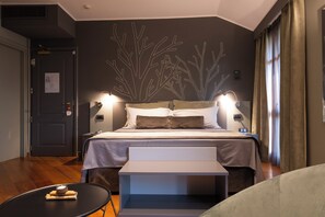 Executive tweepersoonskamer | Donsdekens, een minibar, een kluis op de kamer, individueel gedecoreerd