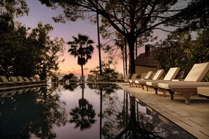 Outdoor pool, open 9:00 AM to 7:00 PM, pool umbrellas, pool loungers