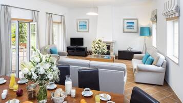 Standard Townhome, 3 Bedrooms, Garden Area | Living area | TV