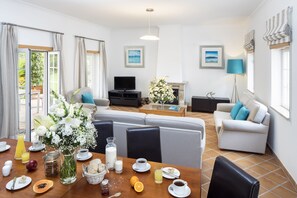 Standard Townhome, 3 Bedrooms, Garden Area | Living area | TV - The Village Praia d'El Rey Golf & Beach Resort (Obidos)