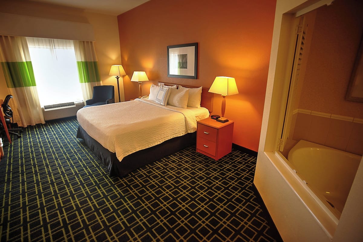 room, 1 king bed, pool access | laptop workspace, blackout curtains, iron/ironing board