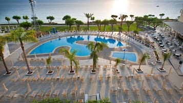 Indoor pool, open 7:00 AM to 6:00 PM, pool umbrellas, pool loungers