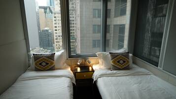 Blackout curtains, iron/ironing board, free WiFi, bed sheets