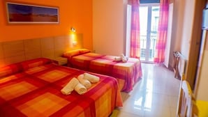A hotel room with two beds, a painting on the wall, a window with curtains, and a radiator. - INTER Puerta del Sol - Auto Check-in (Madrid)