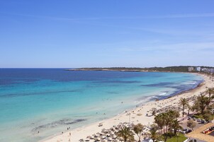 Na praia, toalhas de praia 