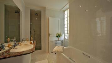 Comfort Suite (For 3) | Bathroom | Separate tub and shower, rainfall showerhead, hair dryer, slippers