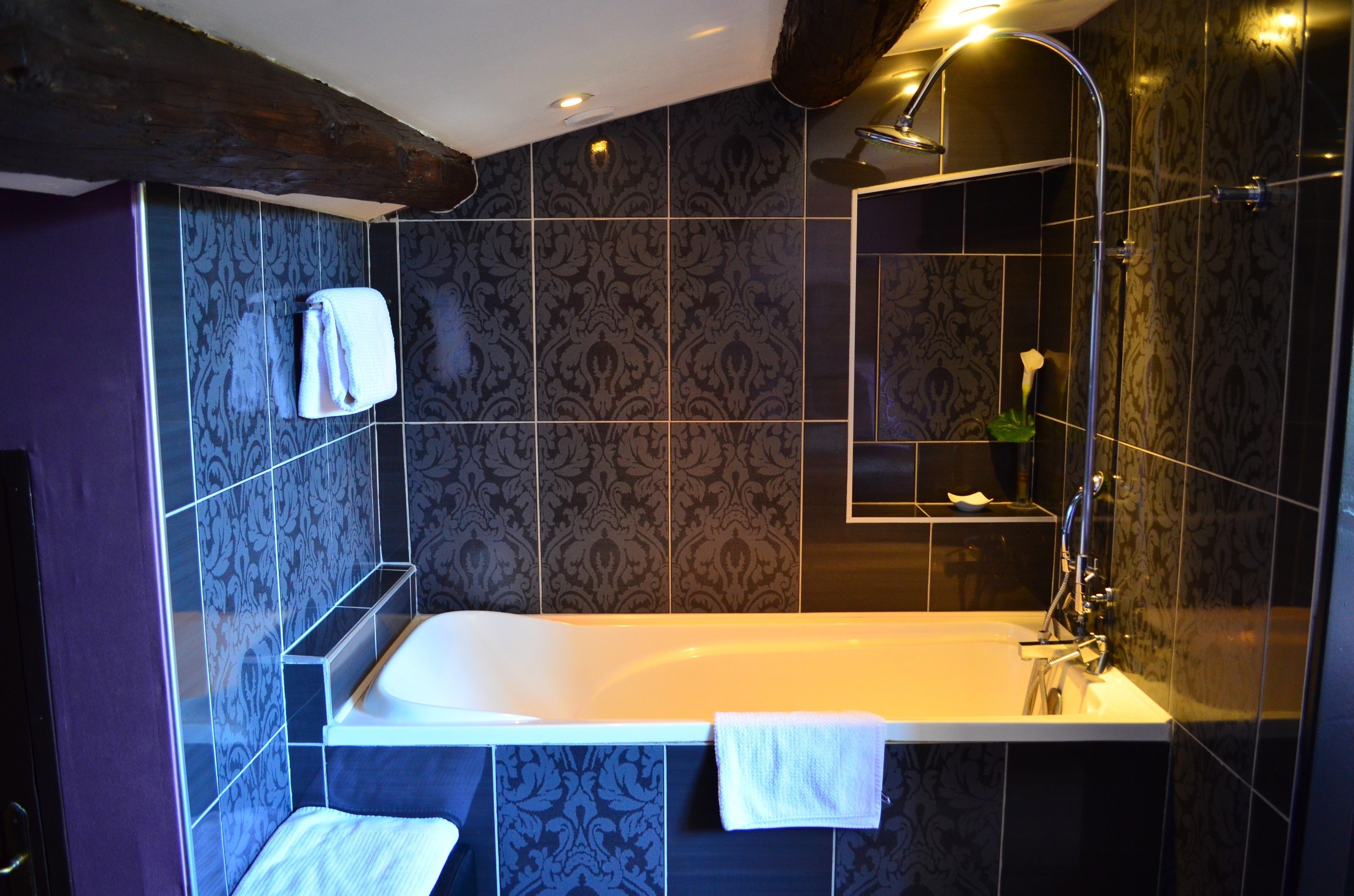 suite | bathroom | bathtub, hair dryer, towels