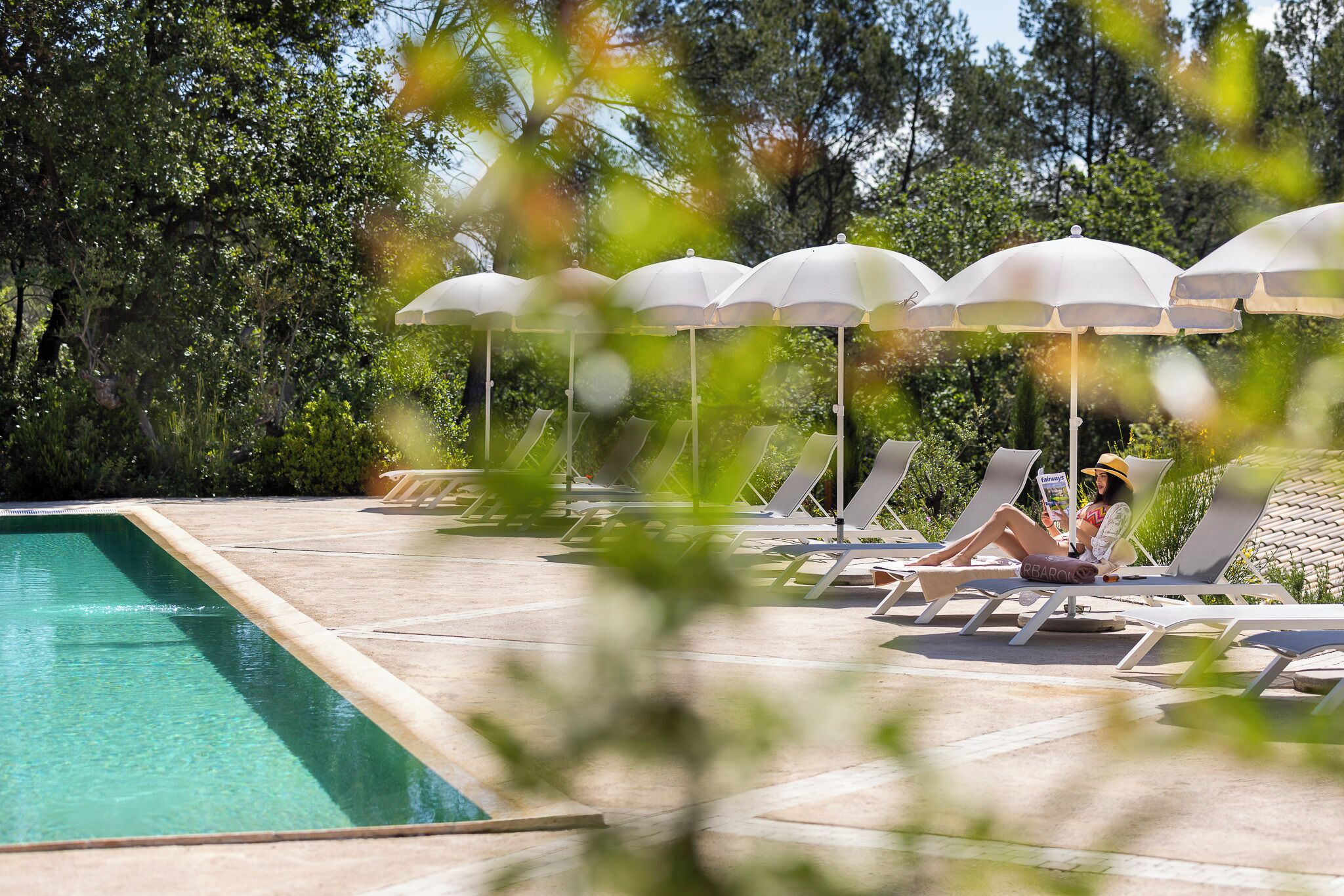 outdoor pool, pool umbrellas, pool loungers