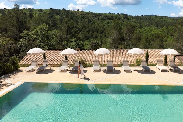 Outdoor pool, pool umbrellas, sun loungers