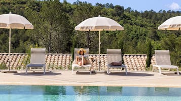 Outdoor pool, pool umbrellas, pool loungers