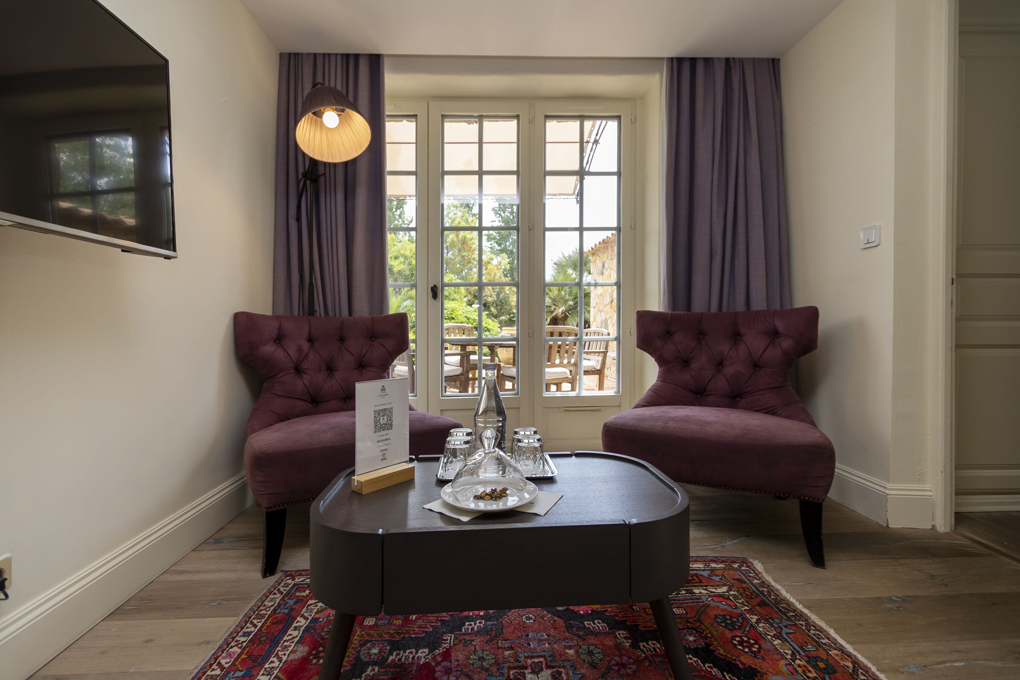 family suite, 2 bedrooms, 2 bathrooms, garden view | living area | 32-inch flat-screen tv with digital channels, tv, ipod dock