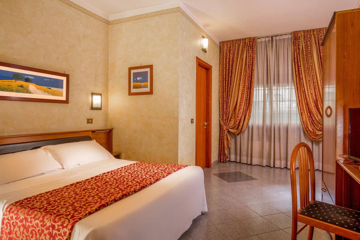 1 dormitorio y ropa de cama de alta calidad