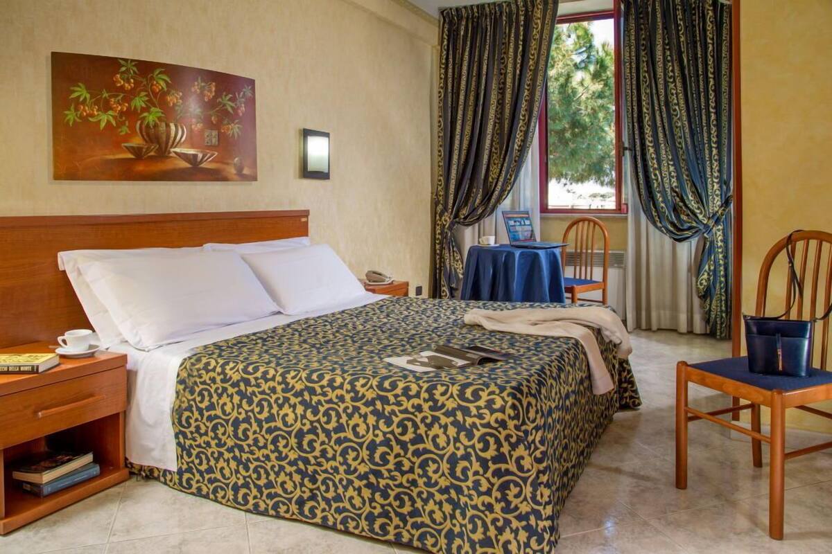 1 dormitorio y ropa de cama de alta calidad