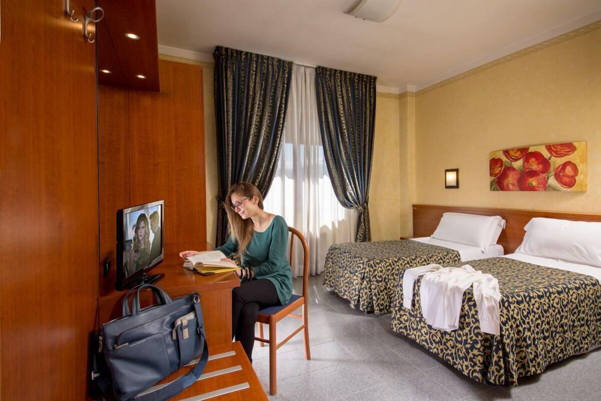 1 dormitorio y ropa de cama de alta calidad