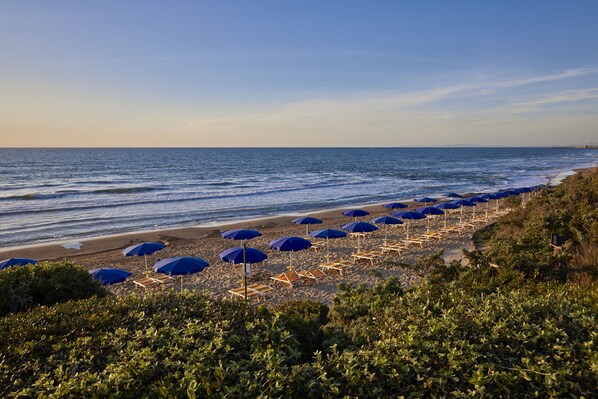 On the beach, beach umbrellas, beach towels