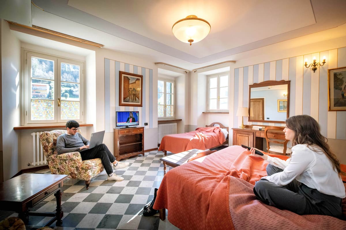 comfort triple room, garden view | down duvets, memory-foam beds, minibar, desk