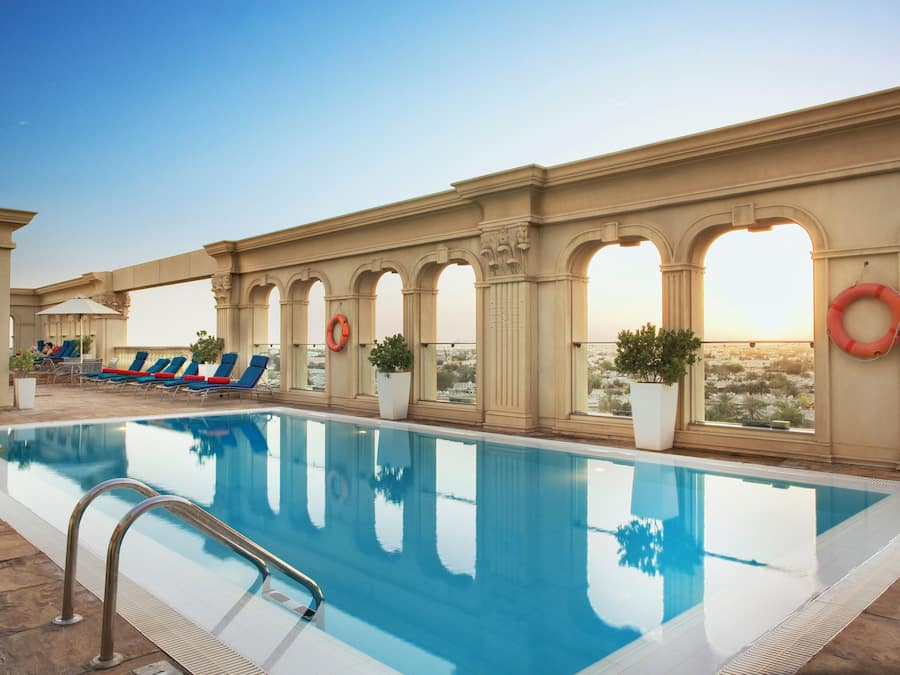 Outdoor pool, open 8:00 AM to 9:00 PM, pool umbrellas, sun loungers