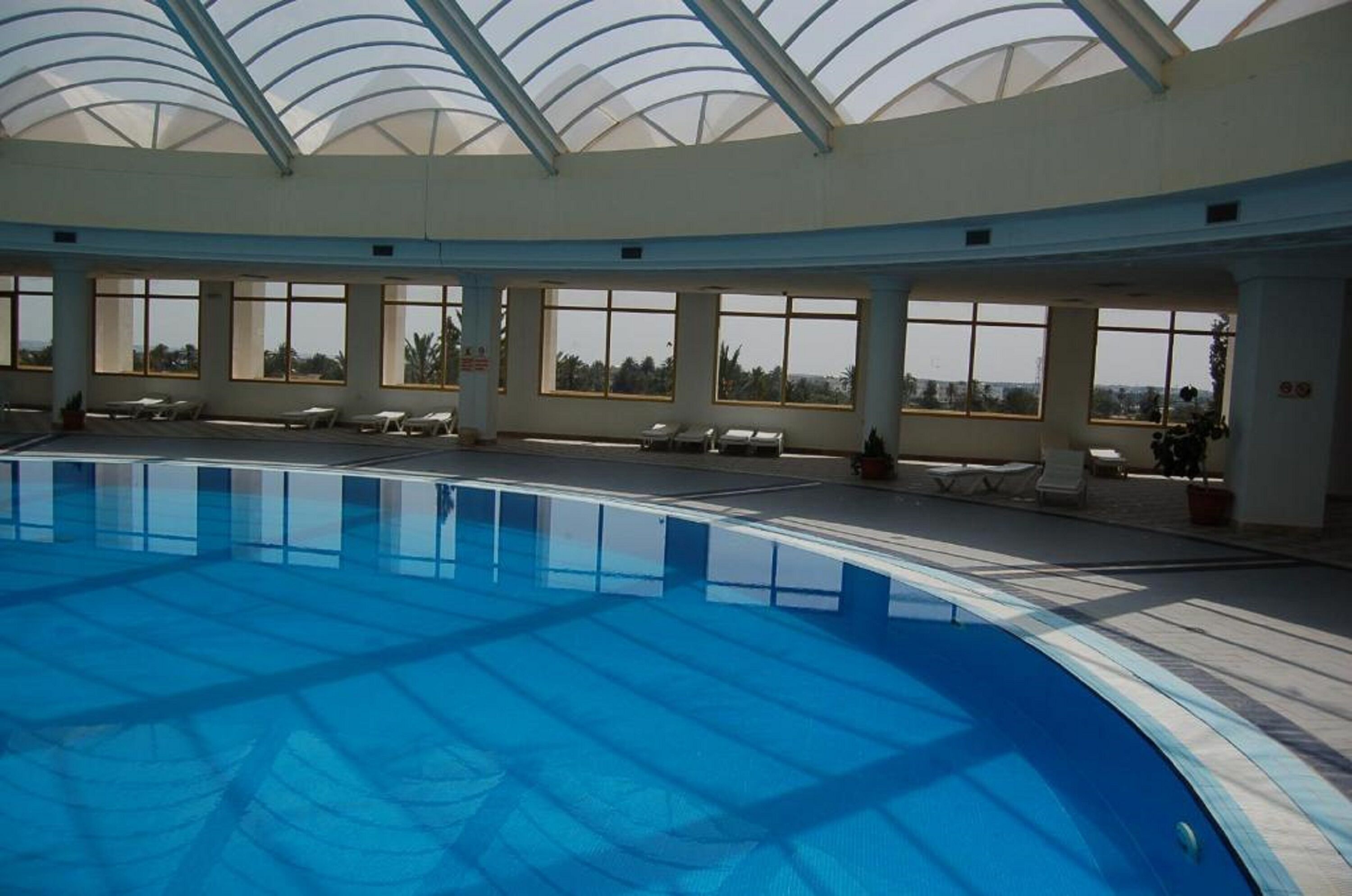 indoor pool, seasonal outdoor pool, pool loungers