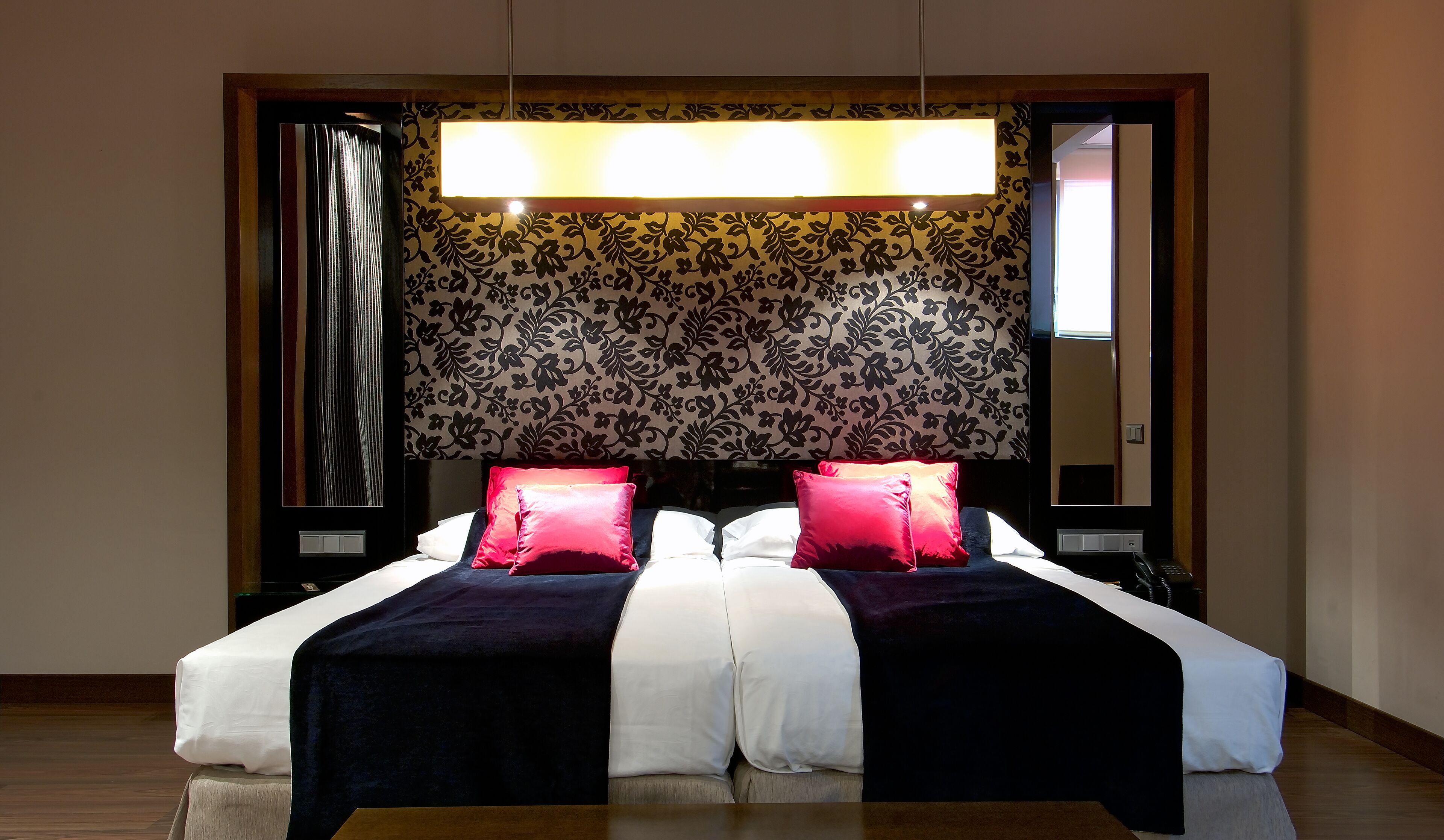 Premium bedding, down comforters, minibar, in-room safe