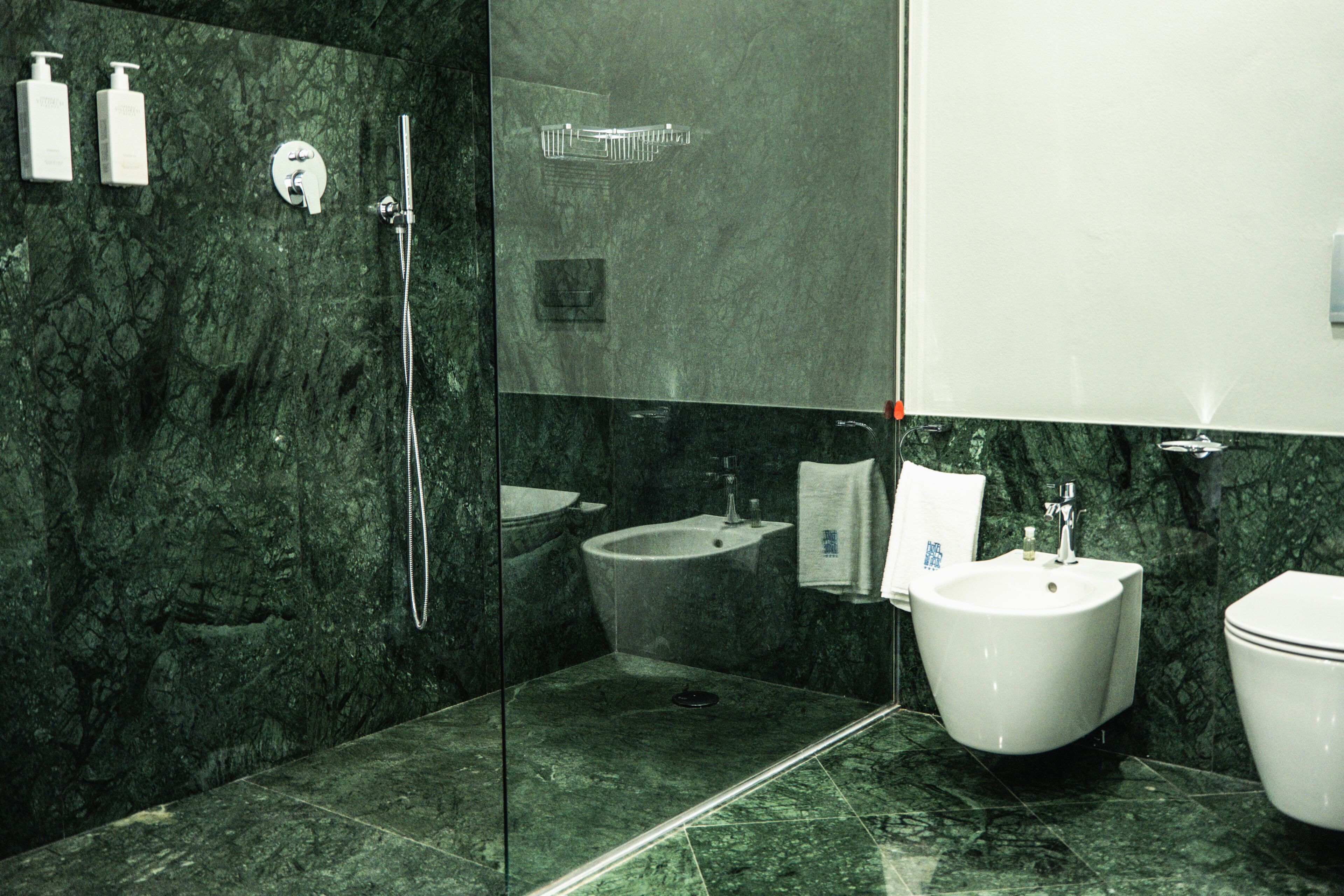 presidential suite | bathroom | shower, rainfall showerhead, free toiletries, hair dryer