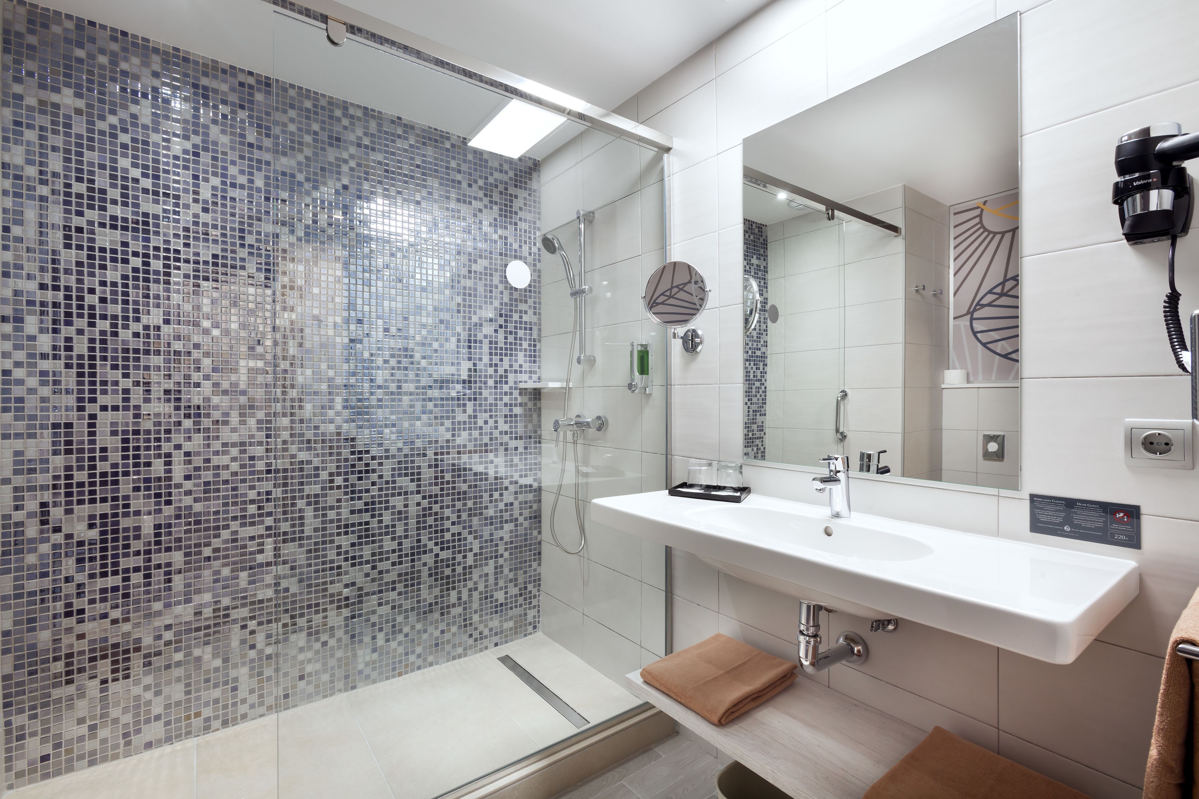 shower, eco-friendly toiletries, hair dryer, towels