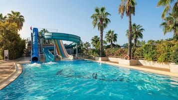 Indoor pool, seasonal outdoor pool, pool umbrellas, pool loungers
