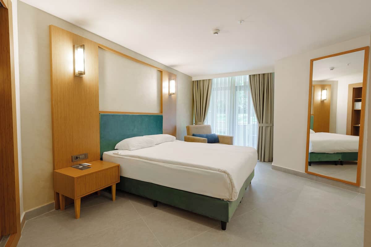 Habitación Club, vista al jardín, en el área del jardín | Camas Select Comfort y artículos del minibar gratis