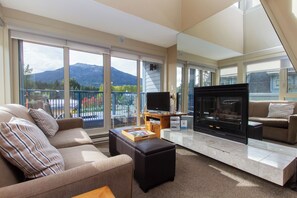 Studio + Loft (Unit 310) | Living area | 50-inch Smart TV with cable channels, fireplace - Village Gate House by Whiski Jack (Whistler)