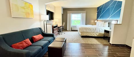 Suite, 1 King Bed, Non Smoking, Jetted Tub | Desk, laptop workspace, blackout drapes, iron/ironing board