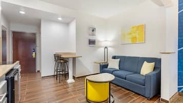 Desk, laptop workspace, blackout curtains, iron/ironing board