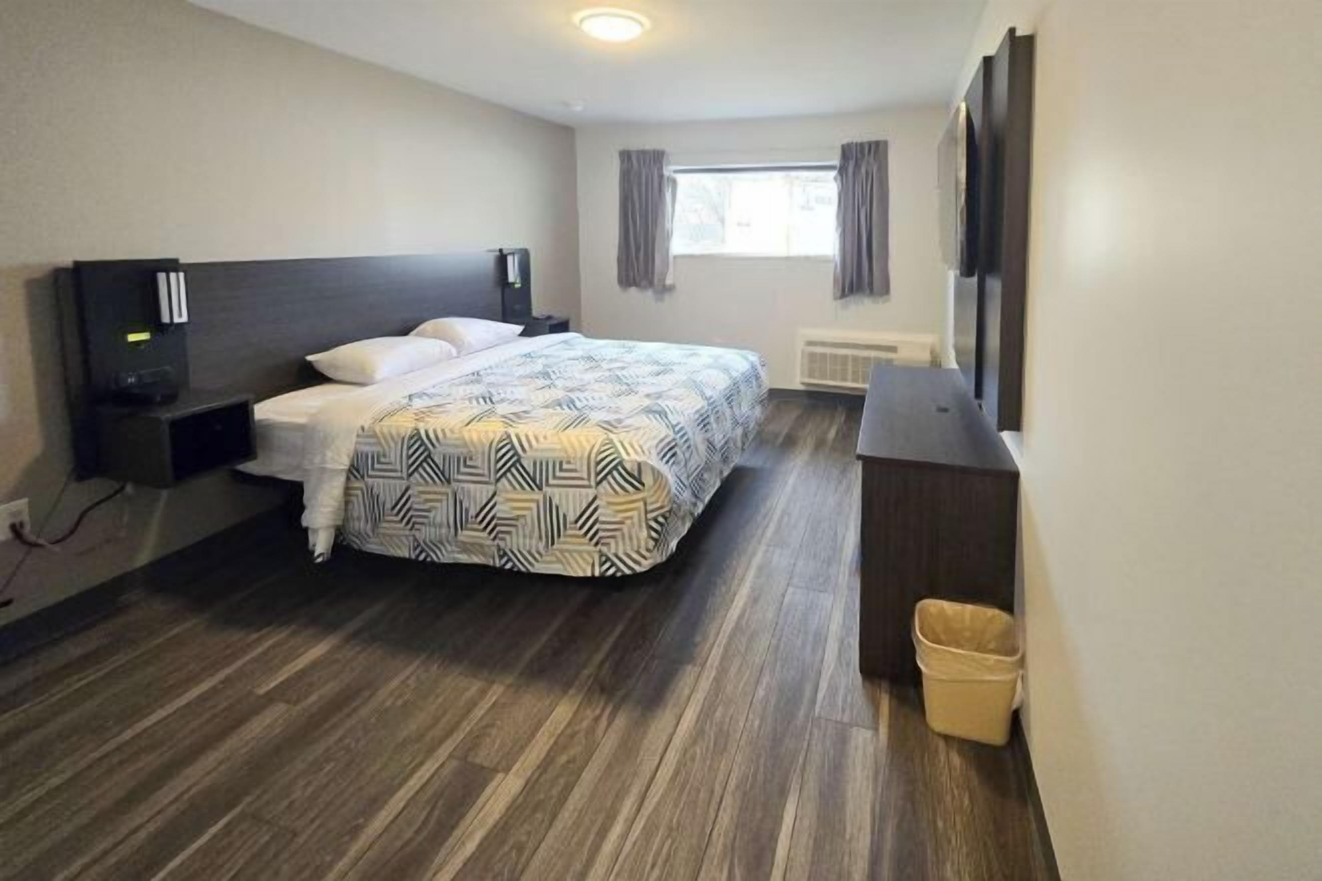 Premium bedding, down duvets, blackout curtains, free WiFi