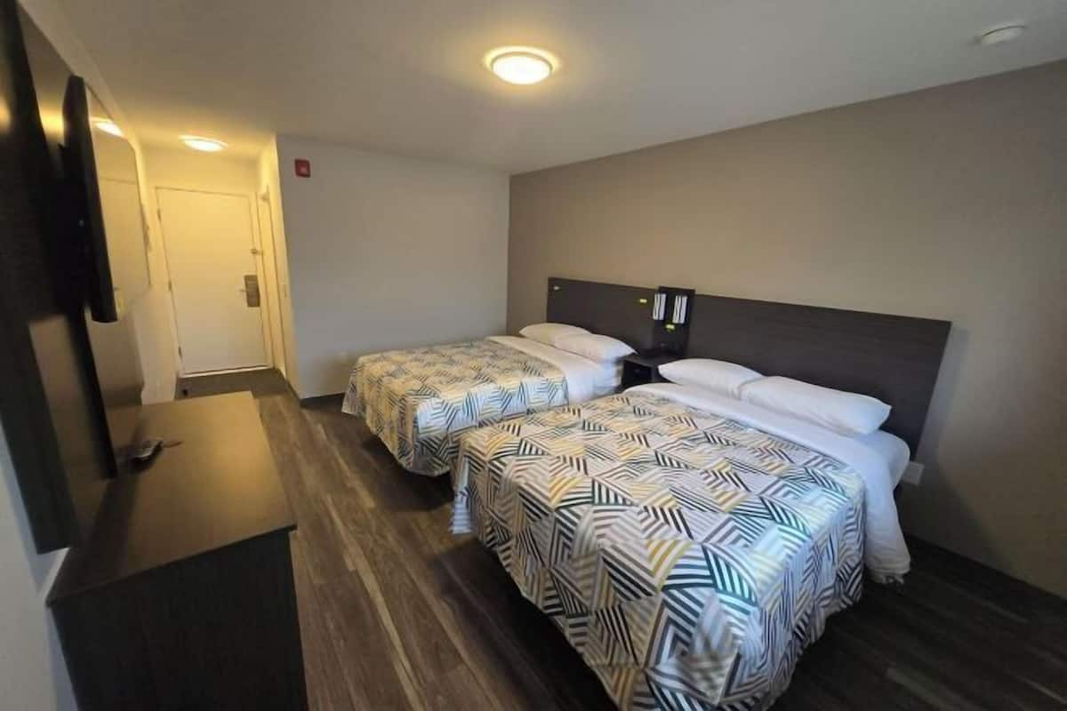 Premium bedding, down duvets, blackout curtains, free WiFi