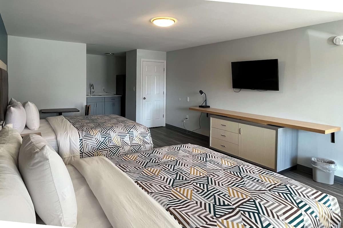 Premium bedding, down duvets, blackout curtains, free WiFi