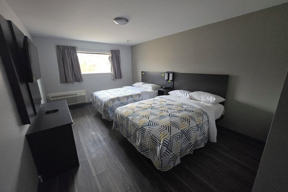 Standard Room, 2 Double Beds, Non Smoking | Premium bedding, down comforters, blackout drapes, free WiFi
