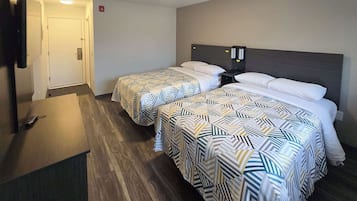 Premium bedding, down duvets, blackout curtains, free WiFi