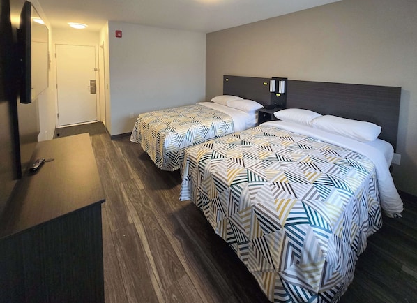 Premium bedding, down comforters, blackout drapes, free WiFi