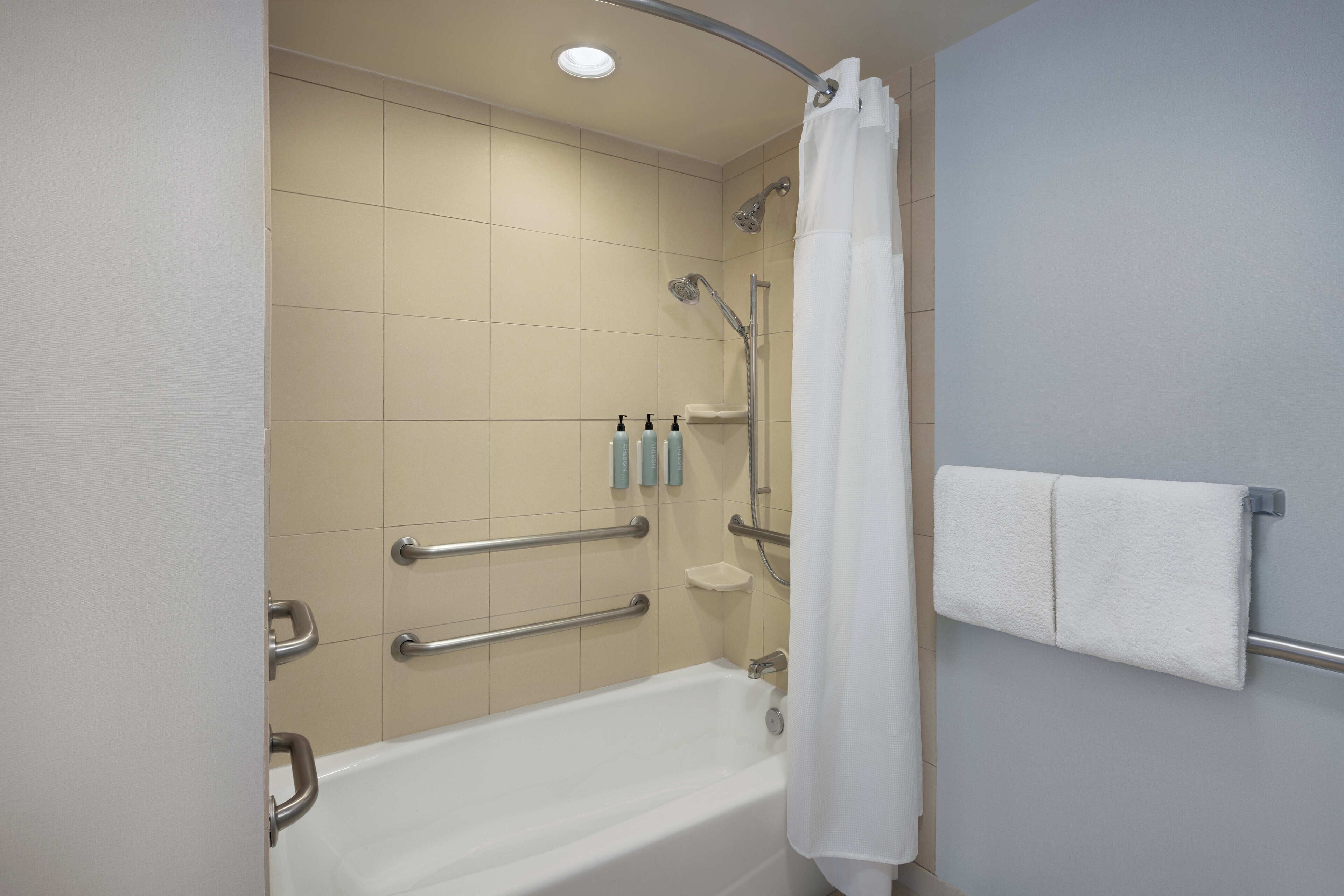 combined shower/bathtub, free toiletries, hair dryer, towels