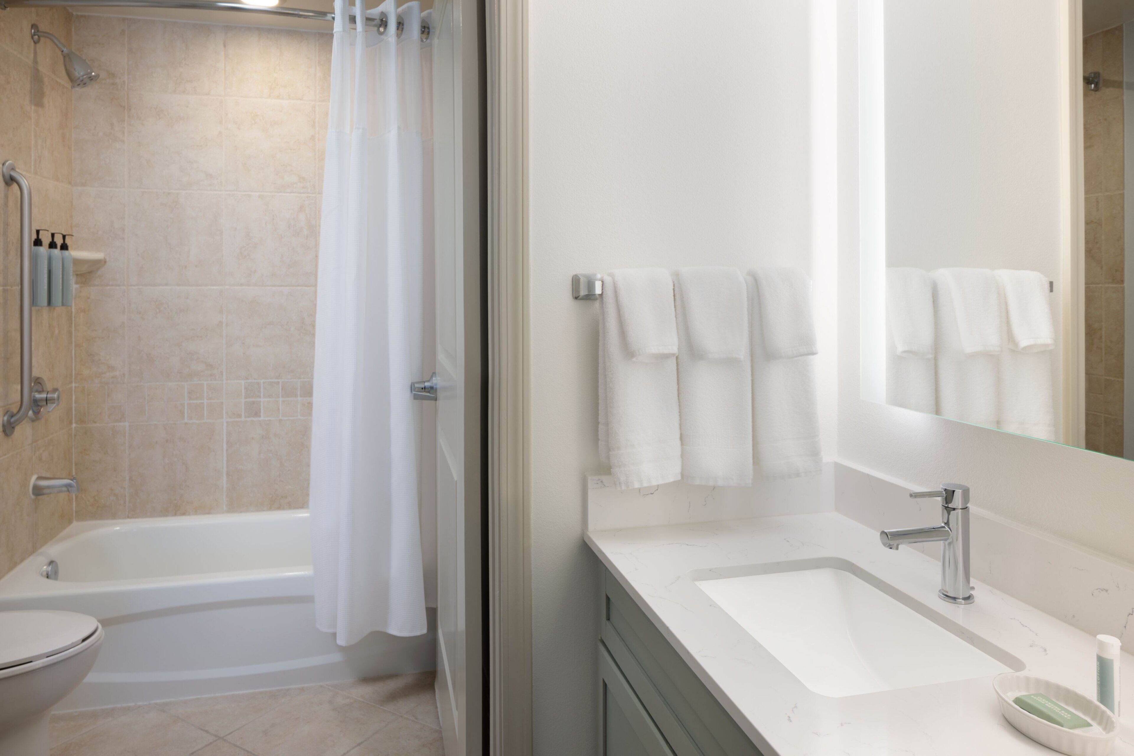 combined shower/bathtub, free toiletries, hair dryer, towels