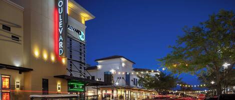 A building with a sign reading "Boulevard" and "Hotel."