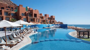 3 outdoor pools, open 8:00 AM to 9:00 PM, pool umbrellas, pool loungers