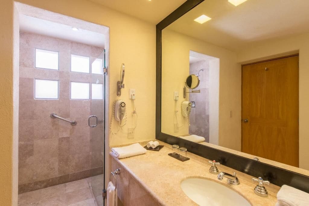 club suite, 1 king bed with sofa bed | bathroom | shower, free toiletries, hair dryer, towels