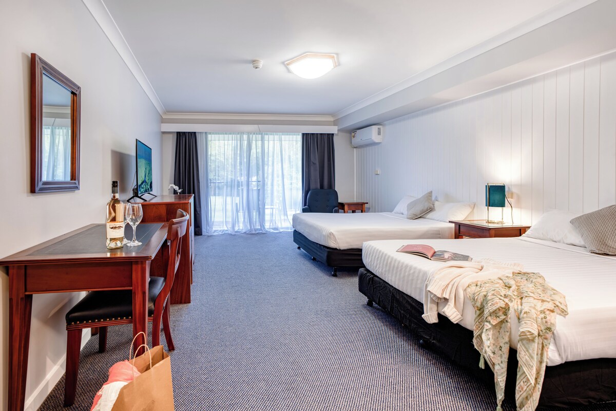 Deluxe Quadruple Room, Balcony, Garden View | Premium bedding, in-room safe, desk, blackout drapes