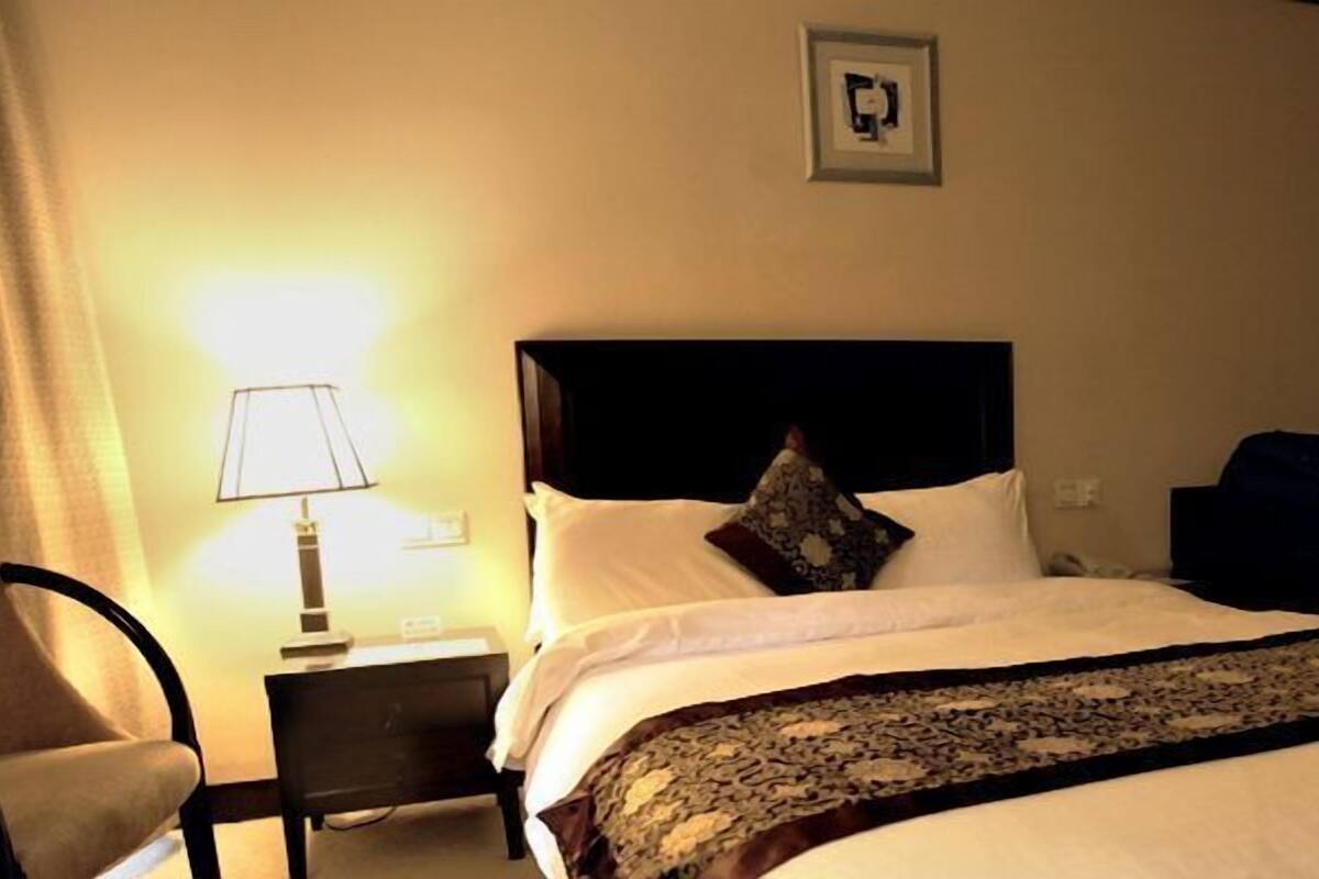 Habitación Deluxe, 1 cama King size | Minibar, camas extra y wifi gratis 