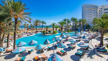 Indoor pool, outdoor pool, open 9:00 AM to 5:00 PM, pool umbrellas