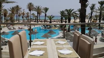 Indoor pool, outdoor pool, open 9:00 AM to 5:00 PM, pool umbrellas