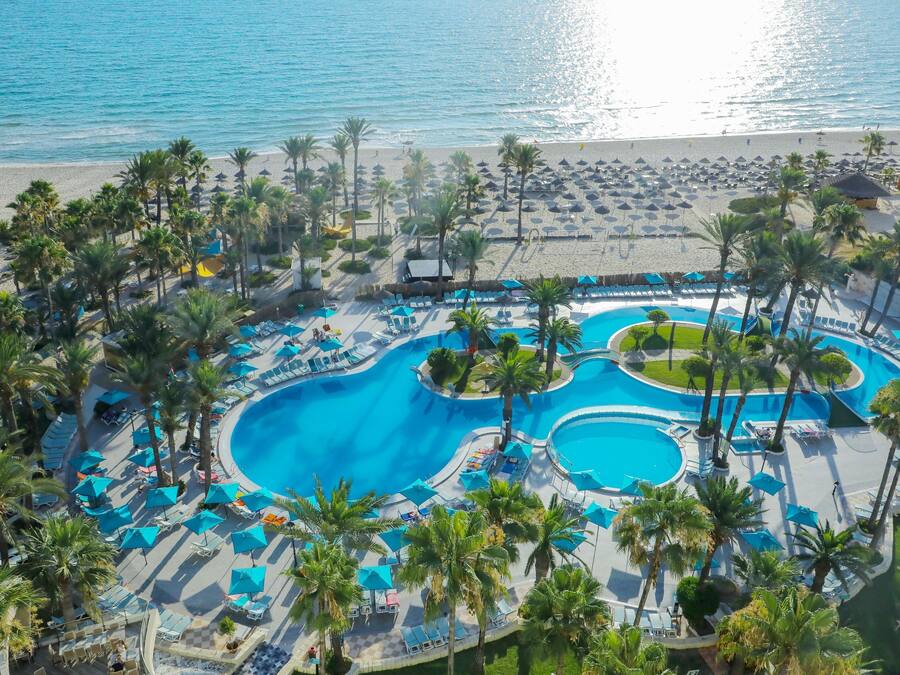 Indoor pool, outdoor pool, open 9:00 AM to 5:00 PM, pool umbrellas